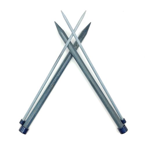 US size 8 and 17 10" straight Lykke Indigo knitting needles crossed on white background